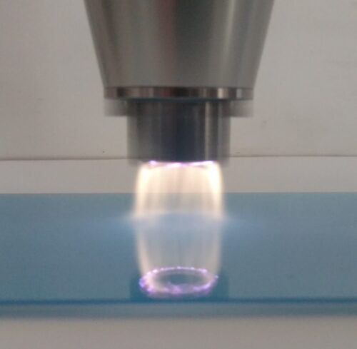 PlasmaDyne head treats a glass panel