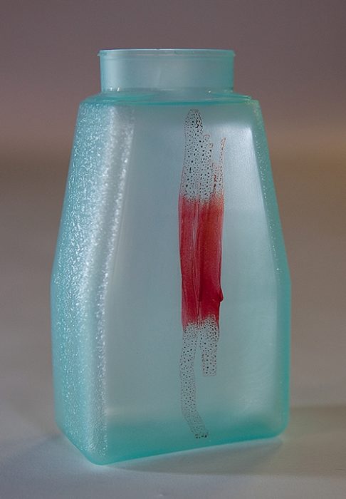 Surface treated bottle